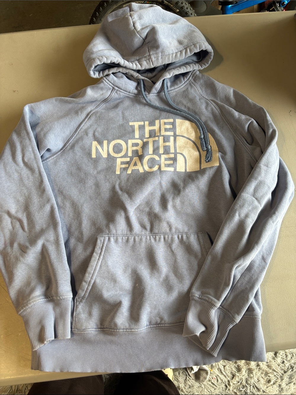 The North Face Pale Blue Pullover Hoodie with White Logo